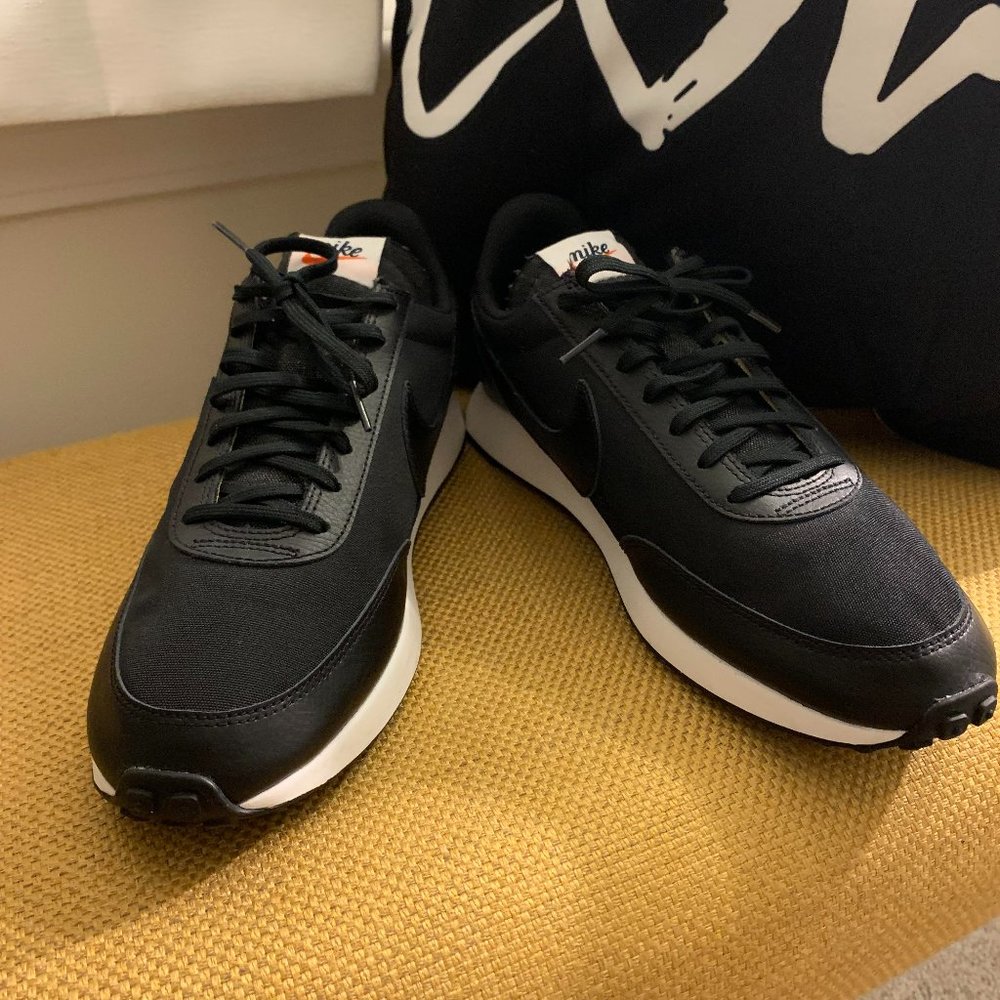 All black Nike women   shoe
